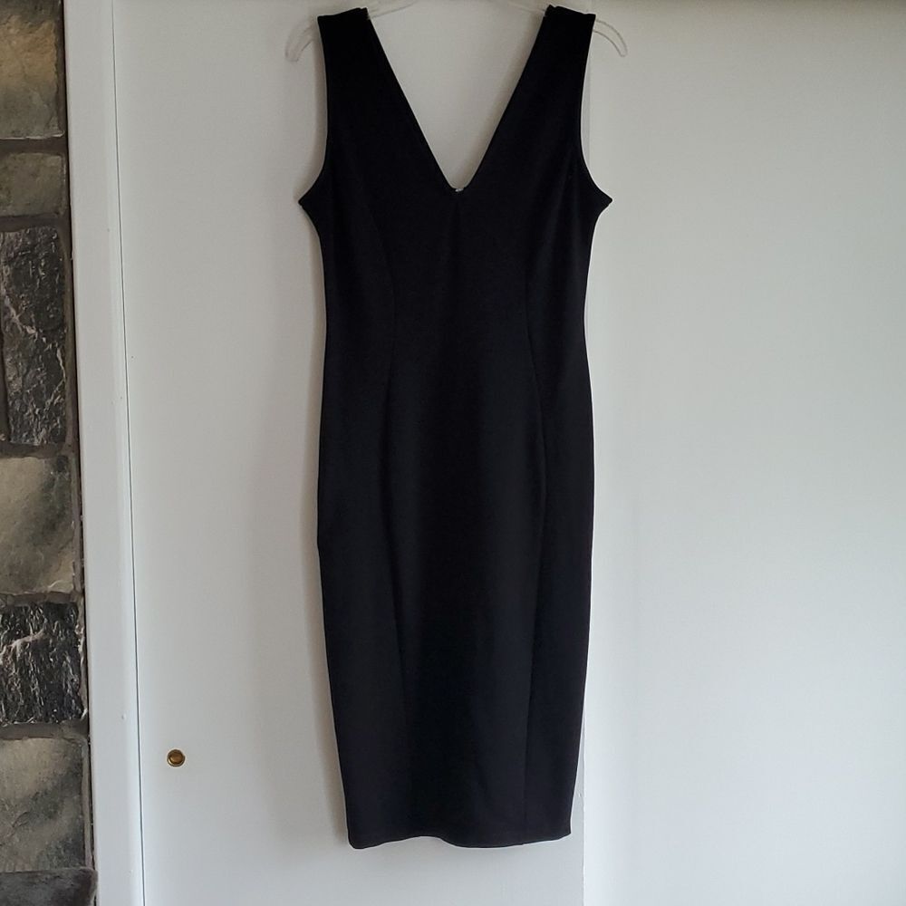 Dress black modern form fit tank style. sz L.  Very Good condition zipper